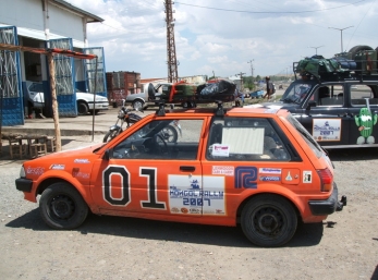 We ran into the Mongolian Starlets getting repaired at the side of the road.